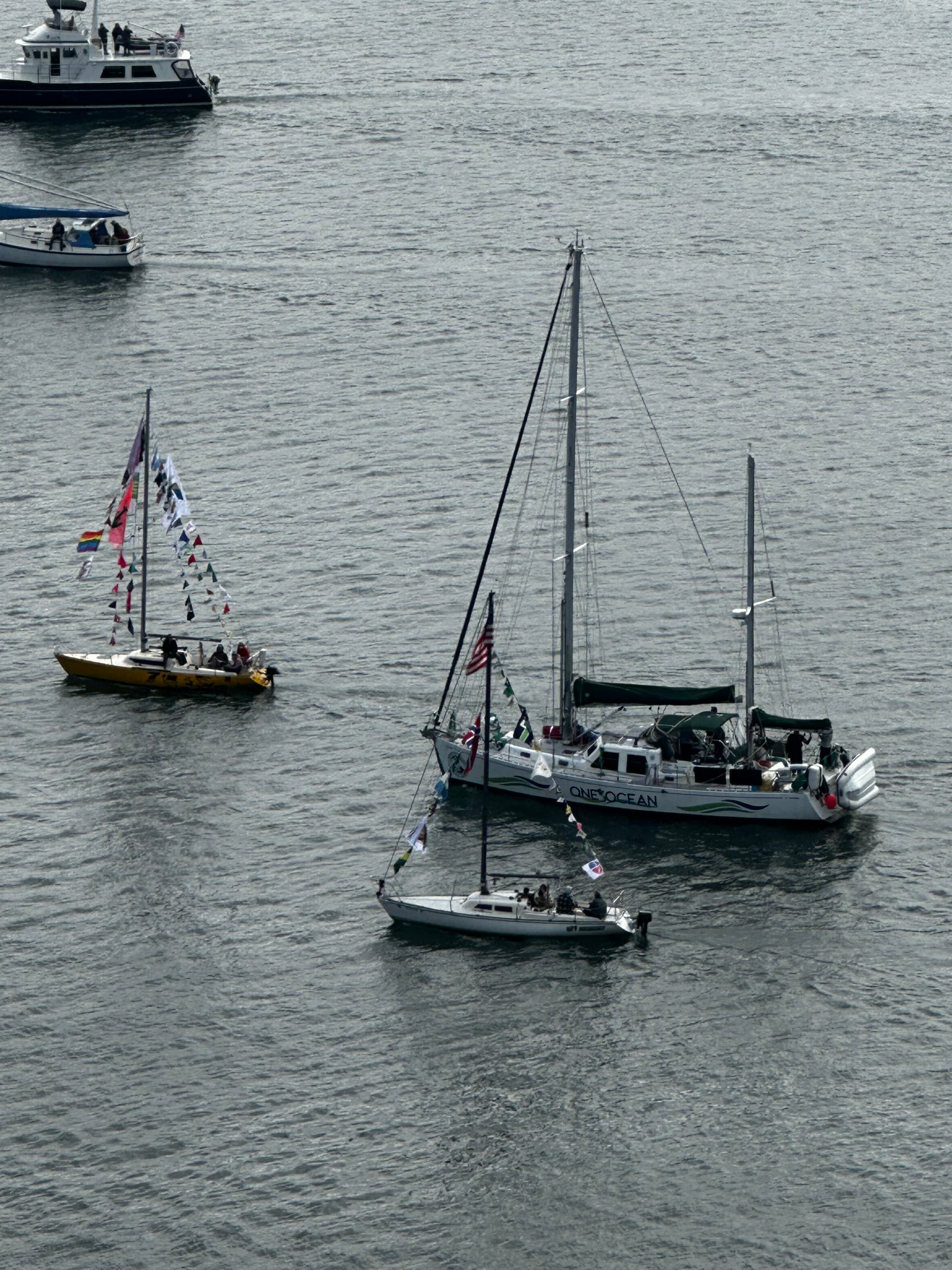 Boats parading out beside One Ocean on their May 3 Launch from Anacortes WA.