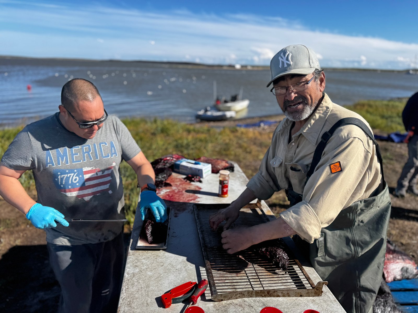 Preparing beluga meat in Tuktoyaktuk