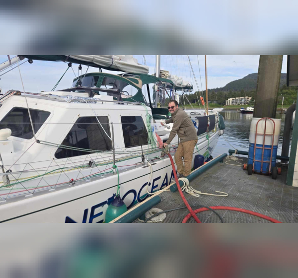 Man fueling a boat
