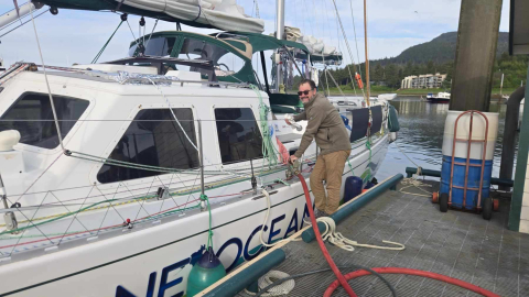 Man fueling a boat