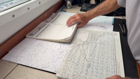 Mark plots our position daily, recording where we are and how many nautical miles we ha…